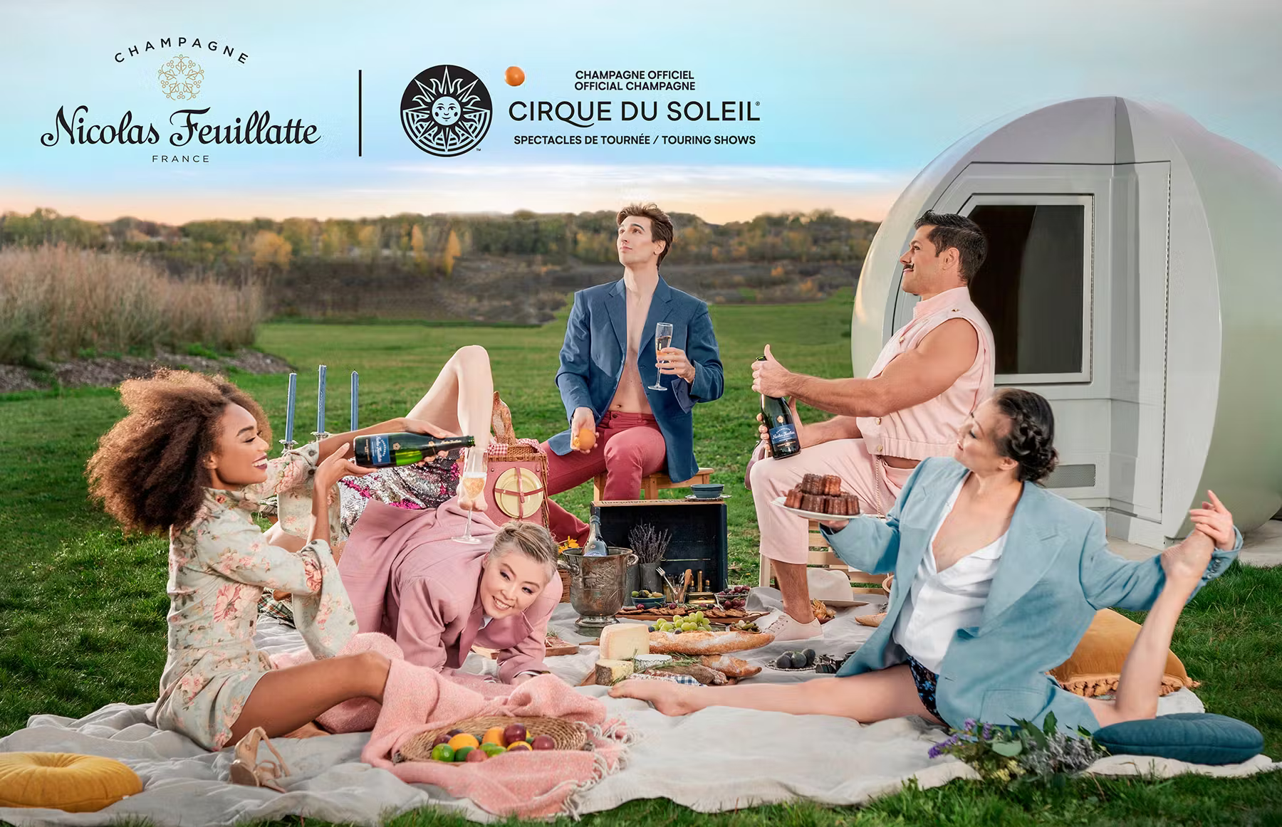 Cirque du Soleil performers beside a Nicolas Feuillatte champagne presentation