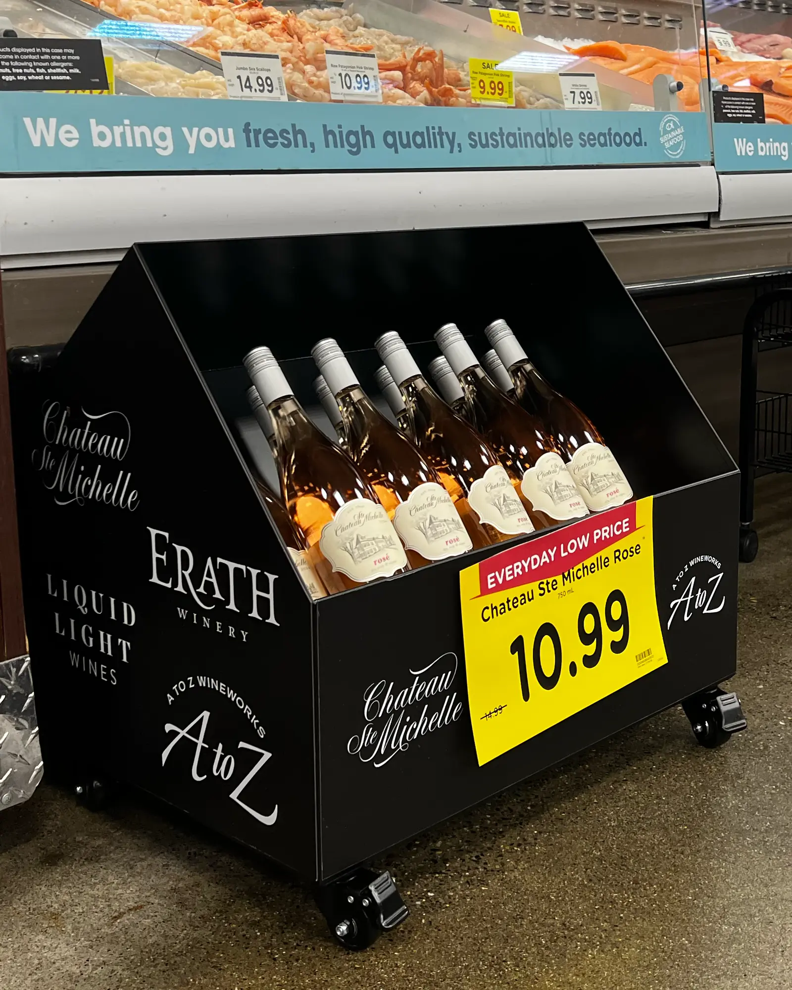 Ste. Michelle Wine Estates rosé display in a Kroger store, below the seafood counter